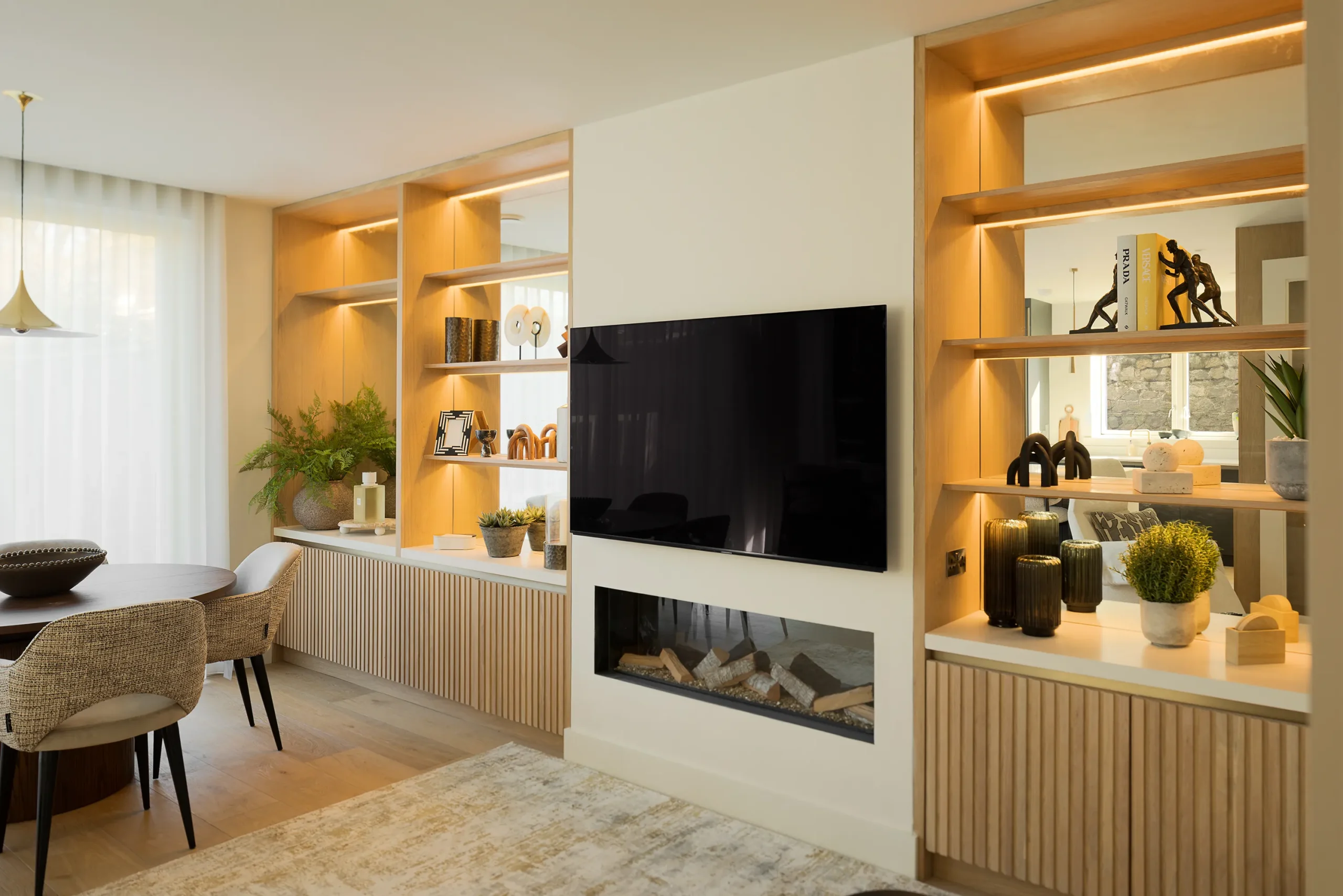 Interior design and joinery detail from the Blackrock home by Gavelle, in a palette of matte charcoal, warm oak, brushed brass and natural stone
