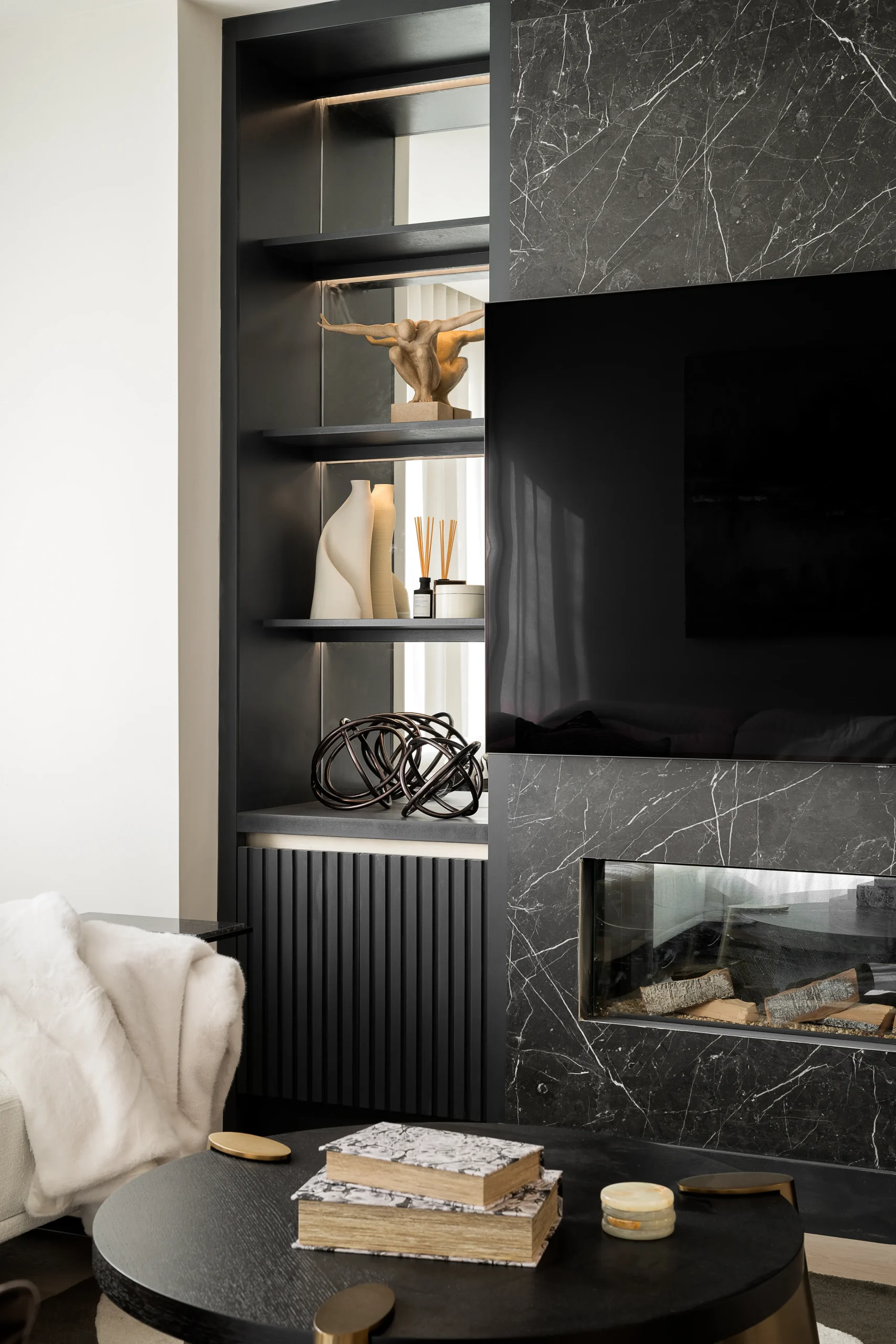 Interior design and joinery detail from the Blackrock home by Gavelle, in a palette of matte charcoal, warm oak, brushed brass and natural stone