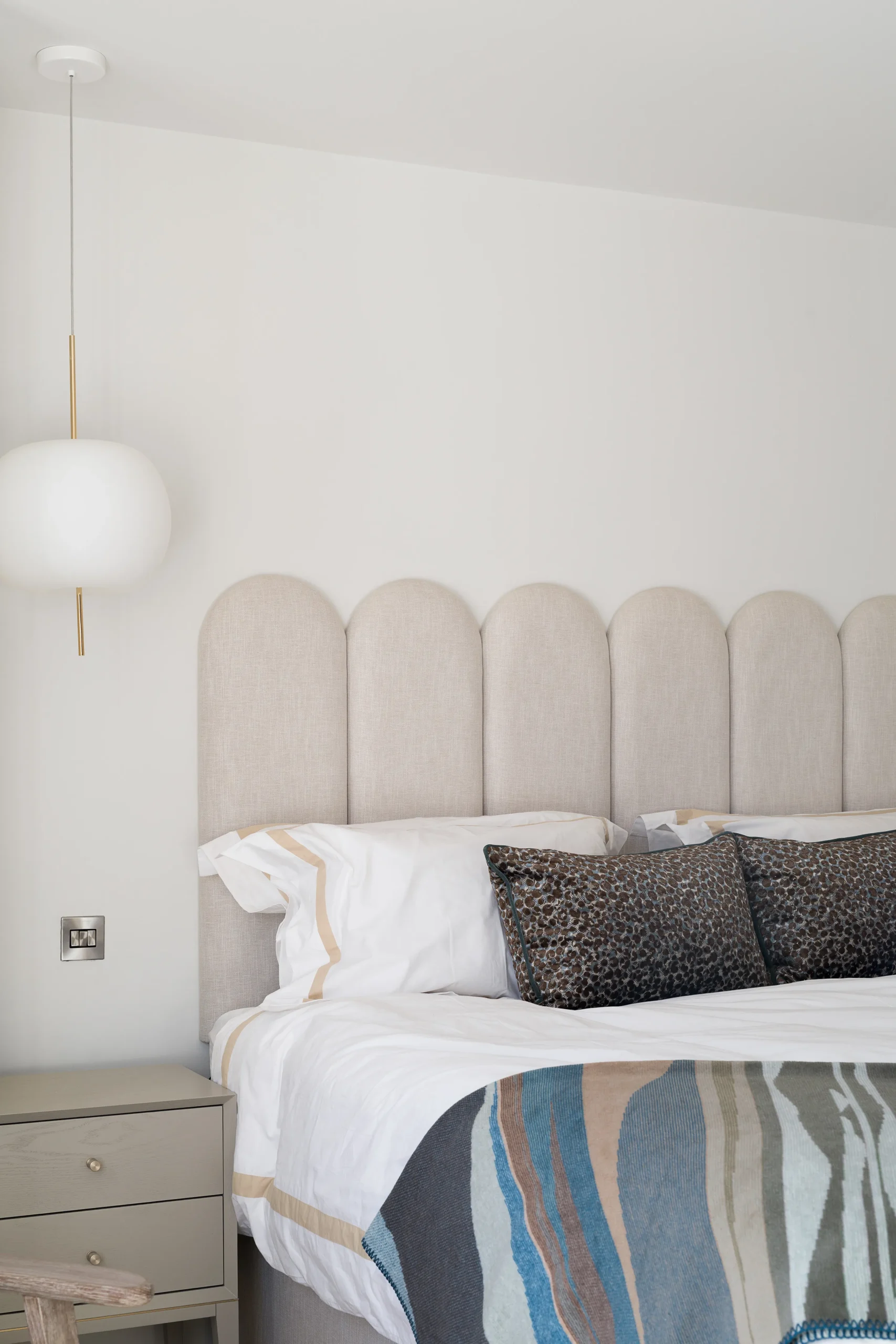 Interior design and joinery detail from the Blackrock home by Gavelle, in a palette of matte charcoal, warm oak, brushed brass and natural stone