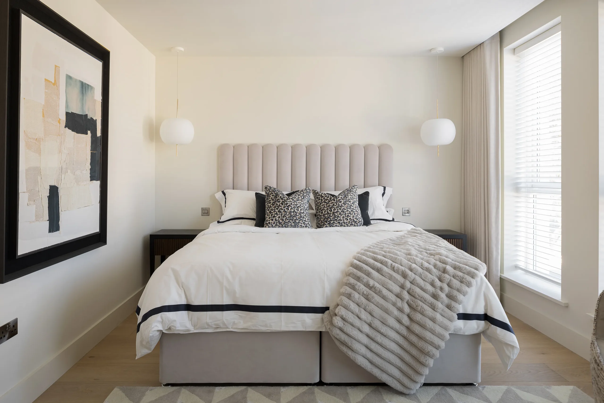 Interior design and joinery detail from the Blackrock home by Gavelle, in a palette of matte charcoal, warm oak, brushed brass and natural stone