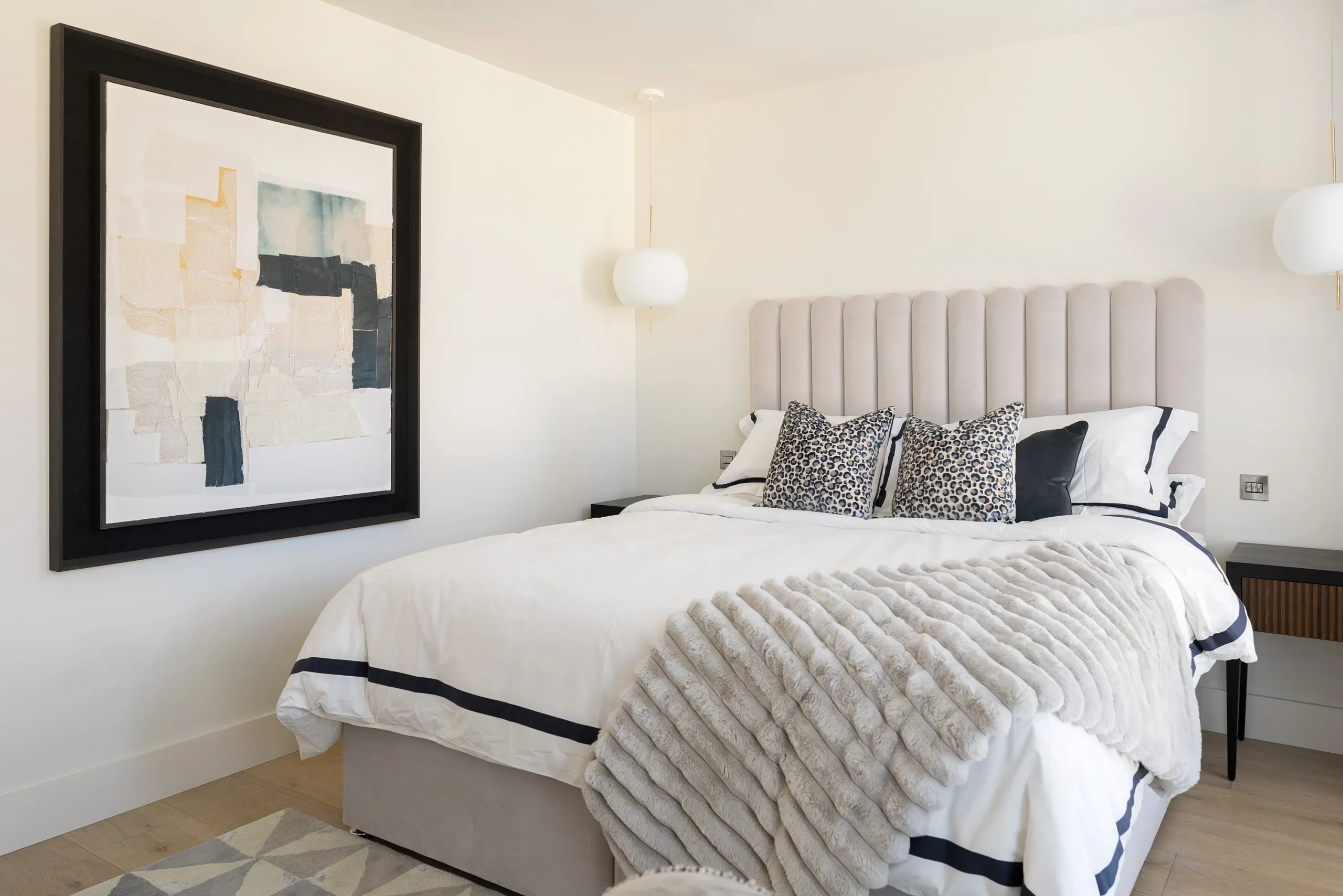 Interior design and joinery detail from the Blackrock home by Gavelle, in a palette of matte charcoal, warm oak, brushed brass and natural stone