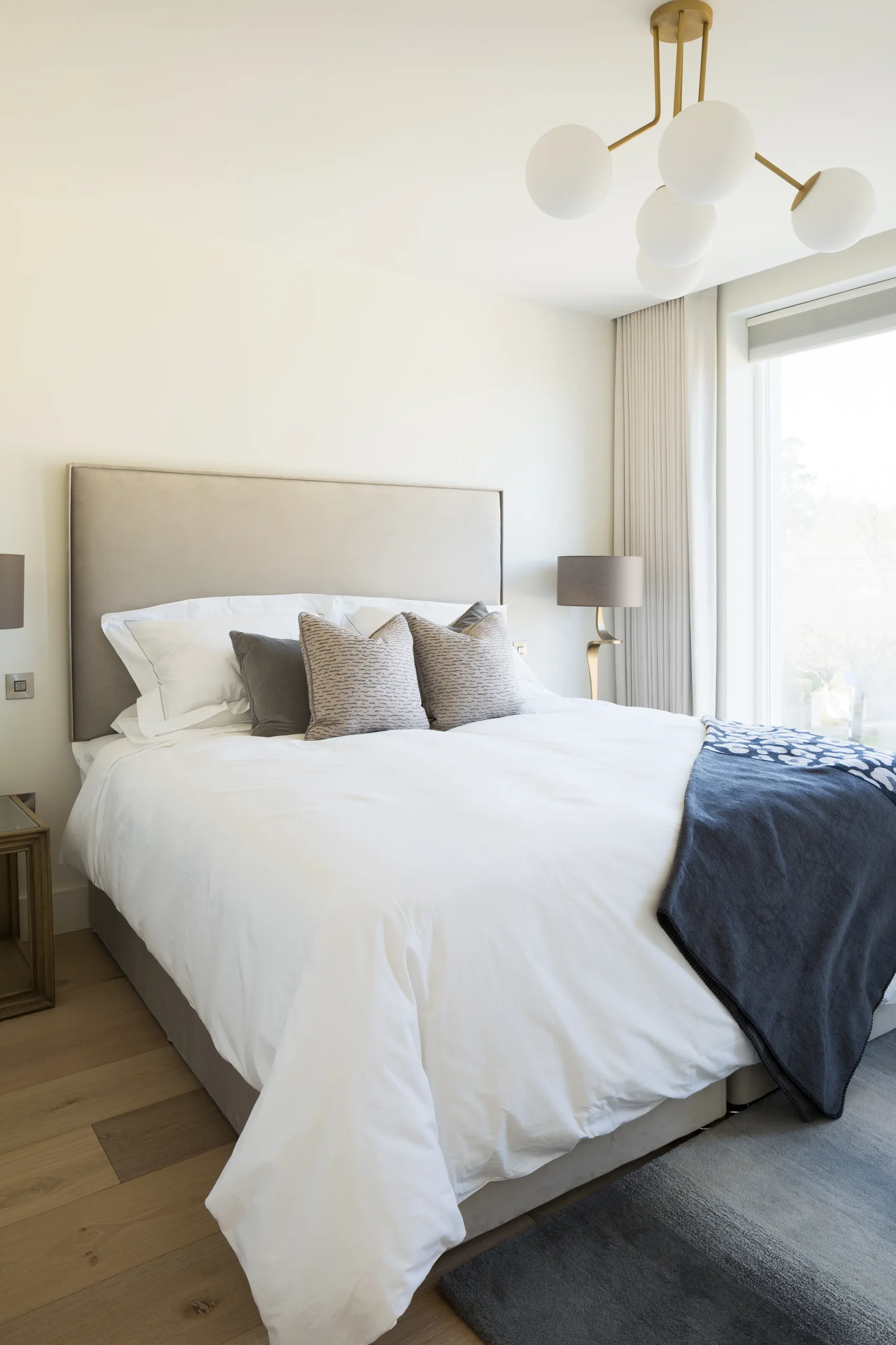 Interior design and joinery detail from the Blackrock home by Gavelle, in a palette of matte charcoal, warm oak, brushed brass and natural stone