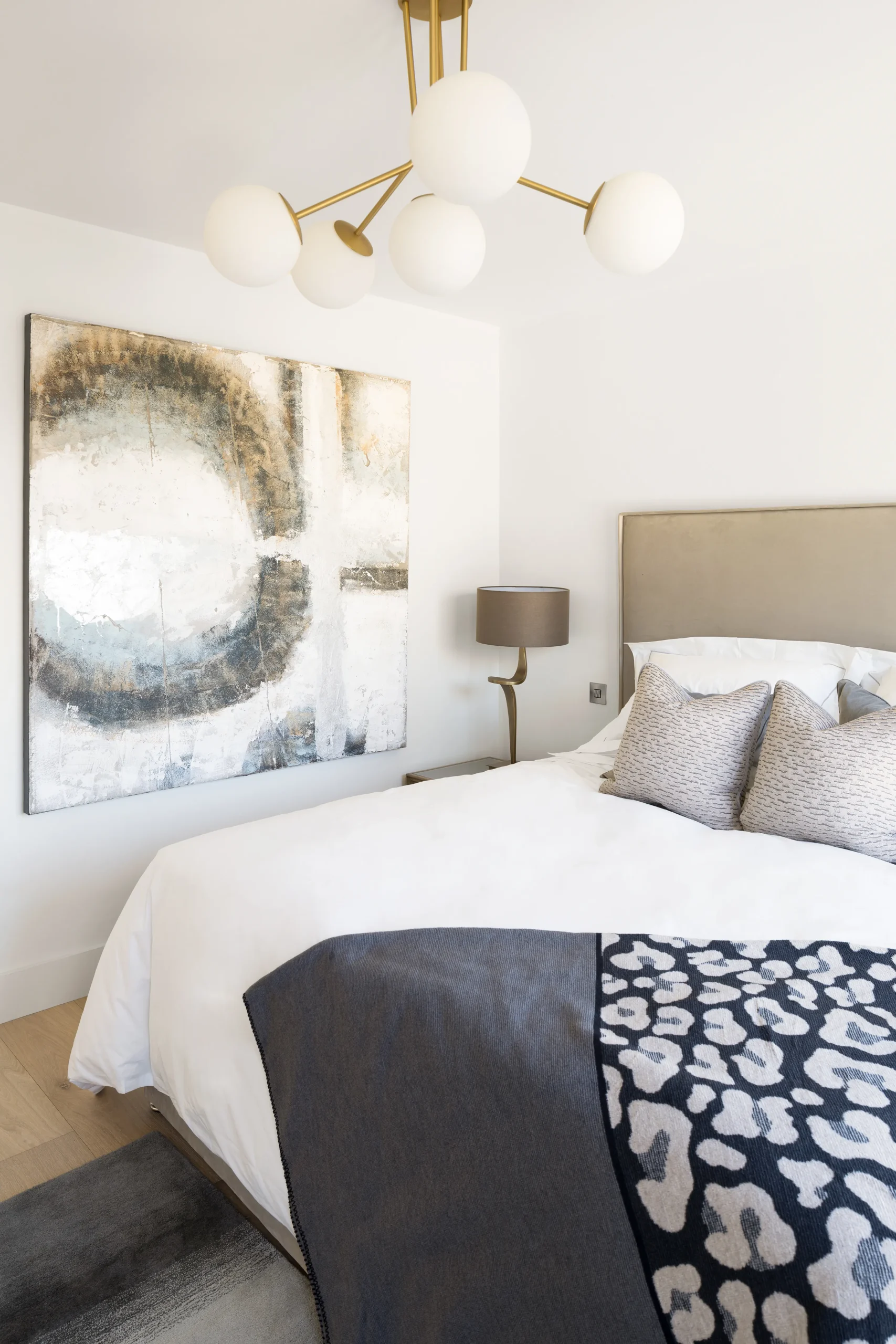 Interior design and joinery detail from the Blackrock home by Gavelle, in a palette of matte charcoal, warm oak, brushed brass and natural stone